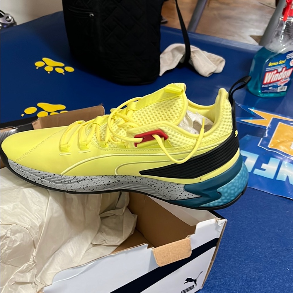 Puma Yellow and Black Sneakers